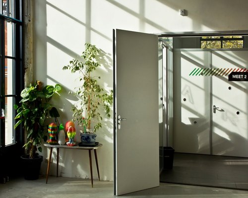 Aesthetic bright workspace with natural light and plants